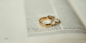 Wedding rings on top of a Bible